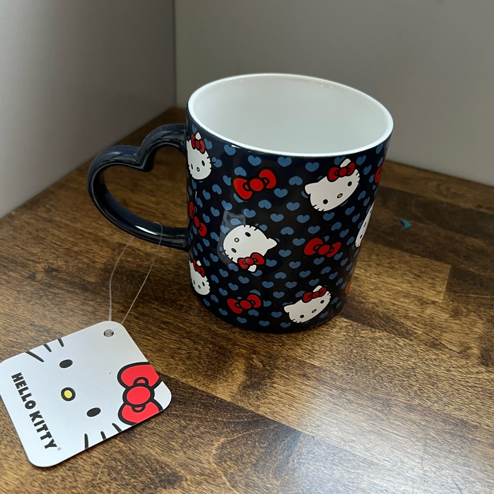 Brand new navy blue Hello Killy heart mug w/ heart handle.